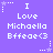 Purple background with white pixelated text reading "I Love Michaela Bffeae<3" repeated in a pattern, surrounded by small star and dot motifs