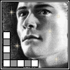 Black-and-white portrait of a person with sparkles, featuring a vertical and horizontal pattern on the left side