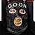 Pixelated black mask with three oval eyes and a mouth, white outline, and white text '600' at top.