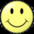 A yellow smiley face icon with black eyes and a curved mouth, set against a black background with pixelated text elements.