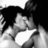 Black-and-white pixelated image of two men embracing, with text reading 'Gay guys are hot' in white block letters on black background.