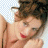 A 48x48 pixel buddy icon featuring a partial view of a person with curly brown hair and red lips on the left, next to green text reading "Original Icons .com" on a dark green background.