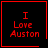 Red pixelated text "I Love Auston" on black background with red border, featuring a heart symbol in bottom-right corner of one and a starburst symbol in another