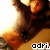 Pixelated image of a character with brown hair and orange clothing, featuring a black star symbol on the chest and 'odri.' text in the bottom right corner.
