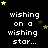 Black background with white pixelated text reading 'wishing on a wishing star...' and scattered yellow and brown stars, with a gray rectangle in the bottom-right corner.