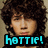 Pixelated image of a person with voluminous dark curly hair and light skin, featuring bold cyan text reading 'hottie!' at the bottom.