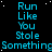 A static digital image displays repeated text in cyan on a black background with white speckles, arranged in four vertical and three horizontal