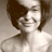 Static grayscale icon of a person with short dark hair and light skin, cropped to show upper body against neutral background.