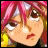 Pixelated anime-style character with pink hair and yellow shoulder accents, next to stylized text on black background.