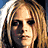 Pixelated close-up of a person with long light brown hair, dark eye makeup, and a neutral expression against a blue and white background.