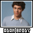 Pixelated portrait of a person with dark curly hair wearing a light blue collared shirt against a solid gray background.