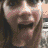 A person with long brown hair and light skin appears in a sequence of showing facial expressions and hand movements