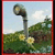 Pixelated image of a tall streetlamp with a rounded top, set against a light blue sky with white clouds, green foliage in the foreground, and a red border.