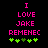 Pixelated text in bright pink reads "I LOVE JAKE REMENEC" above five green plus signs on a black background, with one plus sign changing color between frames.