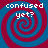 Four identical spiral patterns with red and blue concentric circles, each containing white pixelated text reading 'confused yet?' against a solid background.