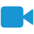 Blue pixelated video camera icon with rounded rectangular body and conical lens, set against light gray background.