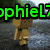 A pixelated character with brown hair and clothing stands against a blurred background, with text above and below changing colors across frames.