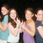 A static image divided into four quadrants with a group photo of five people in the top-left, pink text on white backgrounds in top-right and bottom-left, and solid gray in bottom-right.