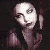 stylized white 'E' and crescent moon symbols on black backgrounds with some star accents, one showing a grayscale portrait of a woman