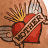 A tattooed arm displays a red heart with wings and a banner, transitioning from full detail to partial visibility