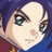 Pixelated anime-style character face with blue hair and green eyes on left, next to black background with white text "Anime IM" above smaller cursive "com" on right.