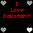 Pixel art displays red text "I Love Dakotah!!!" with heart symbols on black background, showing two animation states of heart positions.