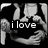 Black-and-white pixelated image of a person holding a microphone with text overlays changing across frames.