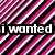 A pixelated image with diagonal pink, white, and black stripes; text reads "i wanted crayons!!!" above a small character face.