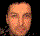 A sequence of pixelated frames showing a person's face transitioning from a clear view to a fragmented, then blurred, and finally a bright, overexposed state with scattered colored dots.