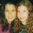 Pixelated image of two people with long brown hair on left, yellow text on pink background reading YIFAT NADLER + YAFFA WEISS = BFFAE.