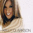 A split-screen image shows a smiling person with long brown hair on the left and bold red text "LOVELY" on a purple background on the right.