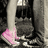 A pixelated image shows a person's legs in dark pants and pink shoes, with red text reading 'Maybe?' on the right side.