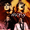 A static image of two people in a performance setting with warm lighting, featuring the text 'mcfly' in white script below them.