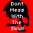 Red background with pixelated skull silhouette and white text 'Don't Mess With The Skull' in four variations showing color changes.
