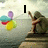 A static image shows a couple embracing on a cliff by the sea with colorful balloons, while text changes from 'I' to 'still love u'.