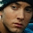 A 48x48 pixel animated contact sheet showing two frames of a low-resolution image featuring a person with dark hair and blue clothing, where the right frame includes red text reading "HOT".