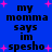 Blue background with black text reading "my momma says im spesho" repeated in four quadrants, pink plus signs scattered throughout.