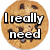 A chocolate chip cookie with text overlay reading "I really need a cookie right now!" in bold white letters.