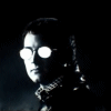 A four- shows a person with glowing white eyes and a dark uniform, with red text 'fear' and 'me' in two