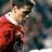 Pixelated static icon of a person in red clothing with white collar against dark background, likely soccer-themed buddy image from early 2000s AOL IM collection.
