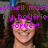 Pixelated image of a person with brown hair and a light-colored top, overlaid with purple pixelated text reading "itchell muss my boyfrie forver!".