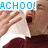 A four- shows a person in a maroon shirt holding a white tissue to their nose, with text changing