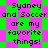 Pixelated text on a green and pink checkered background with alternating diamond-shaped patterns.