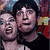 Three distinct facial expressions of two people in a single frame, showing exaggerated smiles and open mouths against a colorful background.