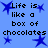Blue background with black text reading "Life is like a box of chocolates" and blue star shapes scattered throughout.
