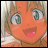 A split-screen buddy icon featuring an anime-style character on the left and pixelated text on a black background on the right, with visible animation frame differences in facial expression.