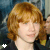 A person with light brown curly hair appears in a of six , each showing slight variations in facial expression and text overlays