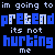 Pixelated text displays 'im going to im going to pretend pretend its not hurting me' with blue and white lettering on black background.
