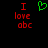 A pixelated image with red text 'I love abc' on both sides of a green heart symbol against black background.