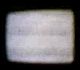 Four rounded-corner rectangular display a sequence of light gray and white pixelated patterns against black backgrounds, showing subtle shifts in horizontal banding